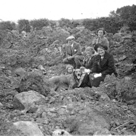 Ross family sitting in the Traprain mine crater.jpeg